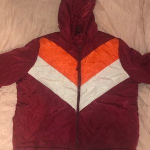 Red orange and white puffy jacket
